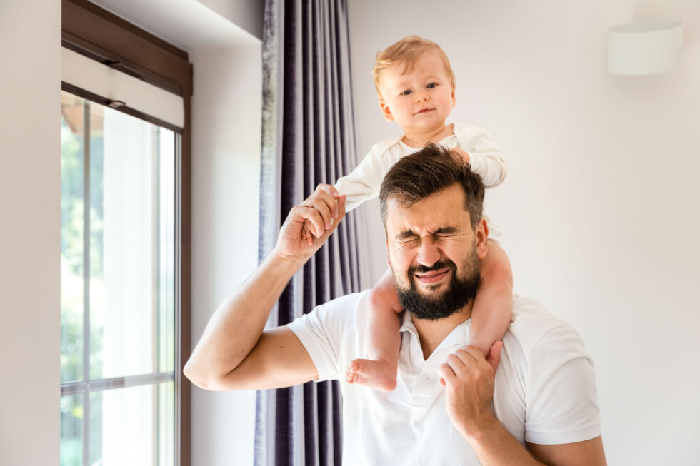 Family photo taken in home. Parents and child on photo. Family photography in Jyväskylä.